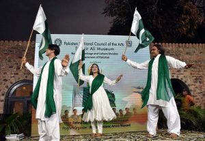 Artists performing during the Marka-e-Haq Independence Day celebrations at Shakir Museum late at night
