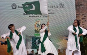 Artists performing during the Marka-e-Haq Independence Day celebrations at Shakir Museum late at night