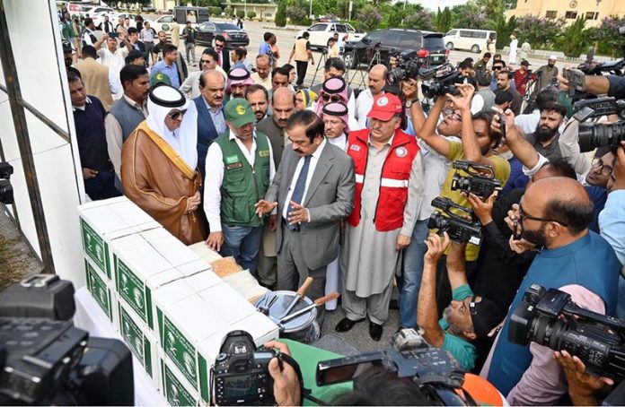 Adviser to Prime Minister on IPC, Rana Sana Ullah Khan, as chief guest receiving flood relief assistance for PDMA from King Salman Humanitarian Aid and Relief Centre for Khyber Pakhtunkhwa’s flood-affected people during a handing-over ceremony at the Sports Complex, Islamabad