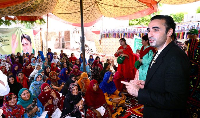 Chairman Pakistan People’s Party Bilawal Bhutto Zardari addressing to flood affectees women during Land titles distribution ceremony under construction of Sindh People’s Housing at Khair Muhammad Brohi Village near Ratodero