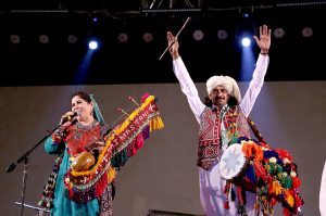 Famous singer Akhtar Chanal performing during mega event of Pakistan Independence Day & Marka-e-Haq grand celebration at Rani Bagh
