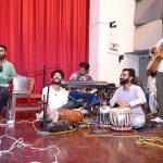 A local musical band performs on stage during Minority Day and Independence Day celebrations organized by Hum Log Organization at Nishtar Hall.