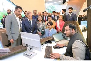 Prime Minister Muhammad Shehbaz Sharif is being briefed on different desks of Board of Investment's 1st Business Facilitation Center.