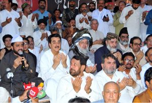 Chairman Senate Syed Yousuf Raza Gilani offering dua during Qul Khawani of his cousin, former Federal Minister Syed Tanveer-ul-Hassan Gillani, at Mosa Pak shrine