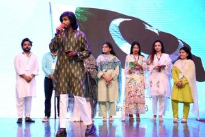 A local musical band performs on stage during Minority Day and Independence Day celebrations organized by Hum Log Organization at Nishtar Hall.