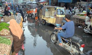 A view of sewerage water accumulated at Latifabad unit number 12 Road need the attention of concerned authorities