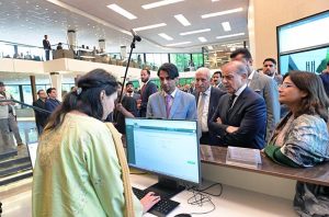 Prime Minister Muhammad Shehbaz Sharif is being briefed on different desks of Board of Investment's 1st Business Facilitation Center.