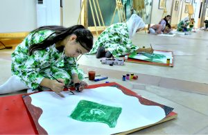 Children participating in painting competition during an event to celebrate the 78th Independence Day of Pakistan organized by Nazaria Pakistan Council Trust at Aiwan Quaid