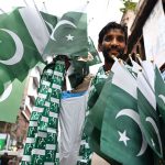 A street vendor selling the Pakistani flags at urdu bazar as the nation starts preparation to celebration of Independence Day in befitting manners.
