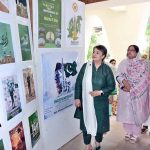 Vice Chancellor of Government College Women University Faisalabad (GCWUF), Prof Dr Kanwal Ameen, reviews the work of participants during a poster competition organized by GCWUF to mark Independence Day and Marka-e-Haq