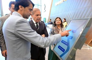 Prime Minister Muhammad Shehbaz Sharif is being briefed on different desks of Board of Investment's 1st Business Facilitation Center.
