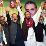 Chairman Prime Minister’s Youth Programme, Rana Mashhood Ahmad Khan, along with PML-N candidate for NA-129 Lahore, Hafiz Mian Nouman, making a hand chain and showing a victory sign during a by-election campaign gathering.