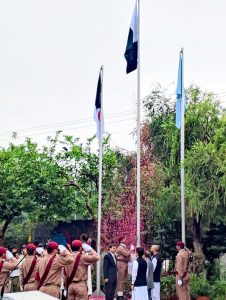 Director National Cyber Crime Agency, General Waqar Syed is hoisting national flag of Pakistan celebrating the 78th Independence Day of Pakistan at Shifa International Hospital