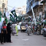 Paper Market decks up in national colors as Independence Day festivities begin, with flags and bounties lining the streets