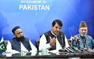 Federal Minister for Kashmir Affairs Amir Muqam addresses a press conference at the Press Information Department (PID).