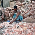 Labourers busy in preparing Khewra natural salt at a local store.