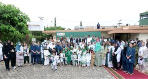 Director National Cyber Crime Agency, General Waqar Syed is hoisting national flag of Pakistan celebrating the 78th Independence Day of Pakistan at Shifa International Hospital