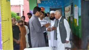 Federal Minister for Board of Investment, Qasir Ahmad Sheikh talking to media after visits flood-hit areas along Jhang–Chiniot Road, In Chiniot, around 100 villages and nearly 100,000 people have been affected by the heavy floods