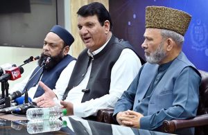 Federal Minister for Kashmir Affairs Amir Muqam addresses a press conference at the Press Information Department (PID).