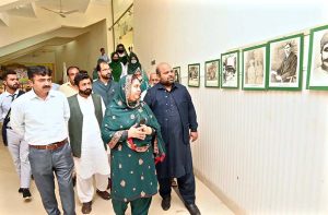 Students taking keen interest in historical pictures displayed during Photo Exhibition titled 'Roshni Ka Safar' based on Pakistan Movement at Sargodha Arts Council