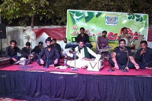 Folk artists performing during musical night at Sargodha Press Club to celebrate Independence Day