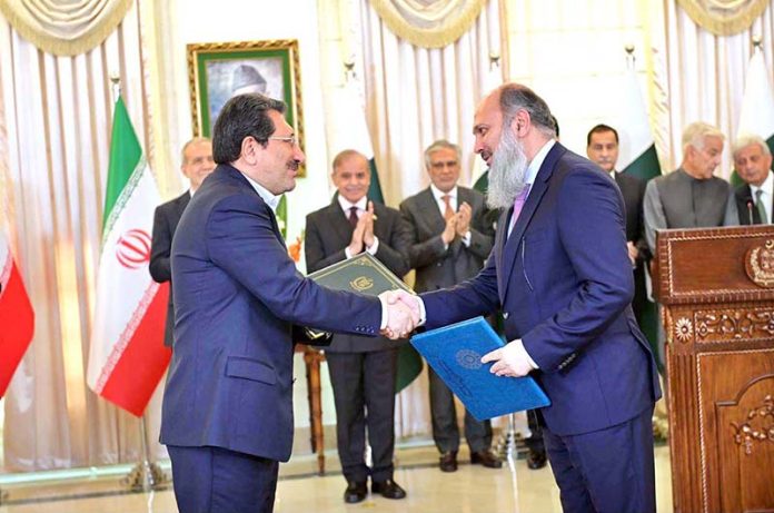 A ceremony of exchange of MoUs for various sectors between Pakistan and Iran