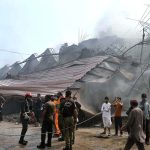 A view of collapsed garment factory building due to get intensive fire at the Karachi Export Processing Zone (KEPZ) near Landhi