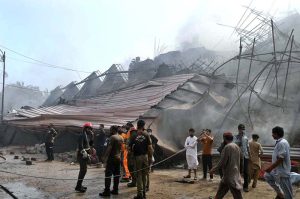 A view of collapsed garment factory building due to get intensive fire at the Karachi Export Processing Zone (KEPZ) near Landhi