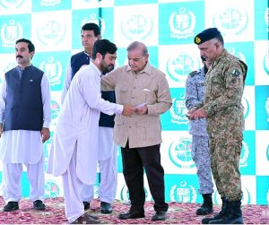 Prime Minister Muhammad Shehbaz Sharif distributing relief cheques among the victims of the recent torrential rains and floods in Buner