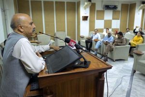 Secretary Ministry of Religious Affairs, Syed Ata-ur-Rehman addresses the Gandhara Interfaith Dialogue organized by PTDC at Allama Iqbal Open University.
