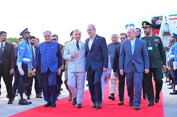 Prime Minister Muhammad Shehbaz Sharif receives Dr. Seyed Ebrahim Raisi, President of the Islamic Republic of Iran and his delegation upon their arrival in Islamabad for a two-day official visit to Pakistan