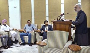 Secretary Ministry of Religious Affairs, Syed Ata-ur-Rehman addresses the Gandhara Interfaith Dialogue organized by PTDC at Allama Iqbal Open University.