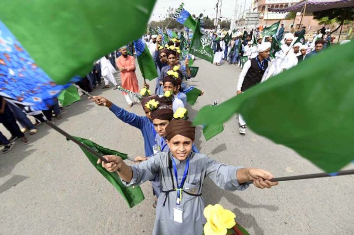Madrassa students take part in a rally organized by the Barkati Foundation on M.A. Jinnah Road in connection with Eid Milad-un-Nabi celebrations