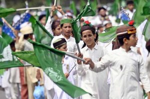 Madrassa students take part in a rally organized by the Barkati Foundation on M.A. Jinnah Road in connection with Eid Milad-un-Nabi celebrations