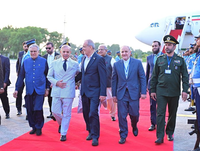 Prime Minister Muhammad Shehbaz Sharif receives Dr. Seyed Ebrahim Raisi, President of the Islamic Republic of Iran and his delegation upon their arrival in Islamabad for a two-day official visit to Pakistan