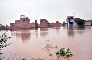 Floodwater from River Ravi is passing through Lahore’s Talat Park Bhadro Pind and submerged the residential area.