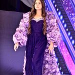 A model walks the ramp in a stylish outfit during the first inter-university fashion show competition at Government College Women’s University Faisalabad (GCWUF)