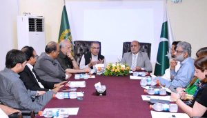 Participants of the panel discussion on the topic 78 Independence Day: Achievements, Challenges and Opportunities for Sustainable Development are sharing their views at PID Lahore office.