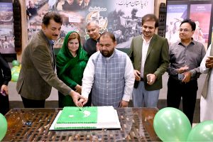 Federal Minister for National Heritage, Aurangzeb Khan Khichi and Parliamentary Secretary for Education, Heritage, and Culture, Ms. Farah Naz Akbar attending the cake-cutting ceremony in celebration of Marka-e-Haq and Independence Day of Pakistan at Lok Virsa
