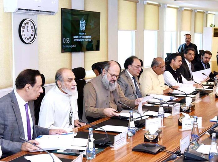 Federal Minister for Finance and Revenue, Senator Muhammad Aurangzeb, chairing a meeting of the Cabinet Committee on State-Owned Enterprises (CCoSOEs) at the Finance Division in federal capital