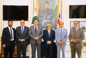 Deputy Prime Minister and Foreign Minister, Senator Muhammad Ishaq Dar, in a group photo with Pakistan-origin British MPs Mohammad Yasin, Tahir Ali, Imran Hussain, Ayoub Khan and Adnan Hussain.