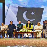 Sindh Governor Kamran Khan Tessori, Sehar Ansari, KPC President Fazil Jamili, and others seated on stage during a Mushaira held at the Governor House as part of the Marka-e-Haq celebrations