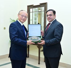 Federal Minister for Economic Affairs, Ahad Cheema, presents a souvenir to Masato Kanda, President of Asian Development Bank