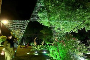 CDA workers decorating the green belt area with lights in the colors of Pakistan's national flag in the federal capital to commemorate the country's 78th Independence Day, 'Maarka e Haq'