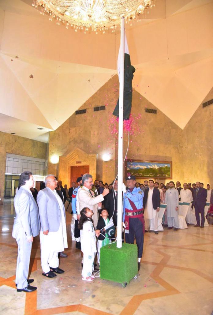 Hon'ble Chief Justice of Pakistan, Mr. Justice Yahya Afridi, hoists the national flag at the Supreme Court of Pakistan during a ceremony marking the 78th Independence Day of the Islamic Republic of Pakistan. The event was attended by Hon'ble Judges of the Supreme Court, the Registrar, officers and staff, as well as children from SOS villages Islamabad and Peshawar