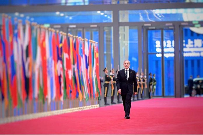 Prime Minister Muhammad Shehbaz Sharif arrives at the Tianjin Meijang Convention Center to attend the welcome banquet organized in honor of the world leaders participating in the 25th SCO Heads of States Council Meeting
