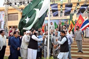Governor Sindh, Kamran Khan Tessori with foreign counsel generals cutting cake at a ceremony to mark Marka-e-Haq, Independence Day Celebrations" (Shuhda Day) at Governor House