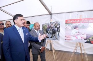 High Commissioner of Pakistan to UK Dr. Mohammad Faisal visiting the photo exhibition on the occasion of Youm-e-Ihtehsal Kashmir organised at Pakistan High Commission.