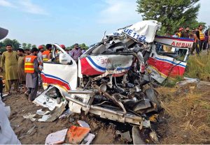Rescue teams shift victims to safety after a deadly collision between a Rescue 1122 ambulance and a passenger coach on Courts Samaba Road in Rahim Yar Khan, which left two people dead and six others, including four Rescue 1122 personnel, injured