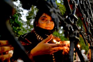 Worshipers lit-up earth lamps at Data Darbar during the 982nd Urs celebration of Data Ali Hajveri while a large number of people arrive to attend the three-day celebrations